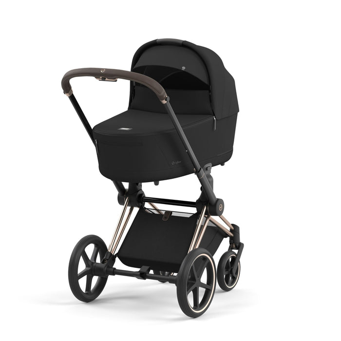 Cybex Priam Rosegold Sephia Black — portbebe takılı, arkadan ¾ görünüm